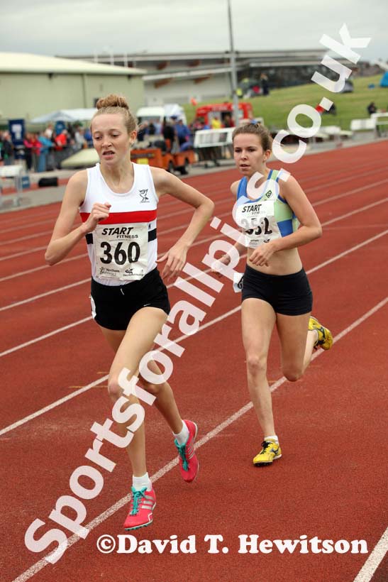 Rosie Johnson (Liverpool Pembroke) leads Amy Hinchly (Vale Royal AC) during the under-17s 1500 metres at the Northern Under-17s and 15s Championships, Liverpool.